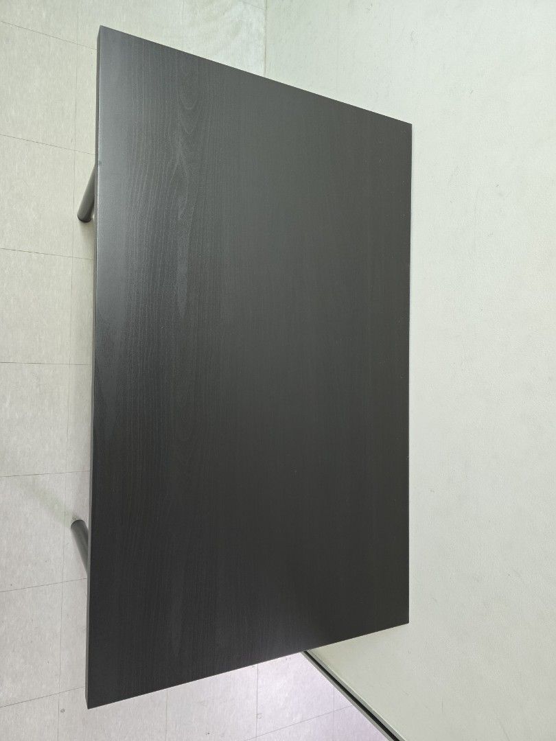 Modern Black Rectangular Table (Category: Tables & Sets) located in Singapore. Submitted by tolin (Listing ID 1444720293, Image 2). Description: - Ikea Table rtp $49.90 - Dimensions 100cm(L)x60cm (W)x73.5cm(H) - Condition as good as new, used with a protective layer - Simple black rectangular table - Sturdy legs for good support - Smooth and flat surface - Perfect as a study desk or small dining table - Easy to clean and maintain - Versatile size