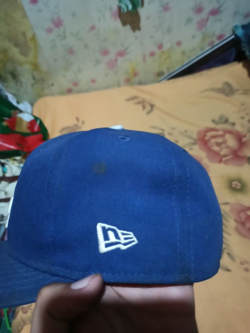 New Era LA Dodgers Fitted Hat Size 7 1/4 (Category: Caps & Hats) located in Manila. Submitted by shortylokox1.1.1 (Listing ID 1444714562, Image 2). Description: - Authentic Blue LA Dodgers Cap - Brand: New Era 59FIFTY Fitted Hat - Size: 7 1/4 (57.7cm).