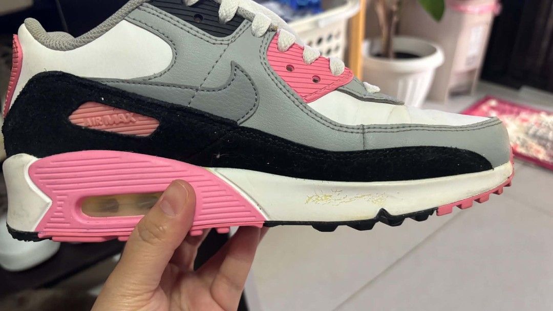 Nike Air Max 90 Pink Grey Black White (Category: Sneakers) located in Muntinlupa City. Submitted by margarita97 (Listing ID 1444790041, Image 2). Description: - Nike Air Max 90 sneakers - Colorway: Pink, grey, black, and white - Features the iconic visible Air unit - Classic and versatile design - Minor scuff marks on the midsole, but plenty of life left - Perfect for everyday casual wear.