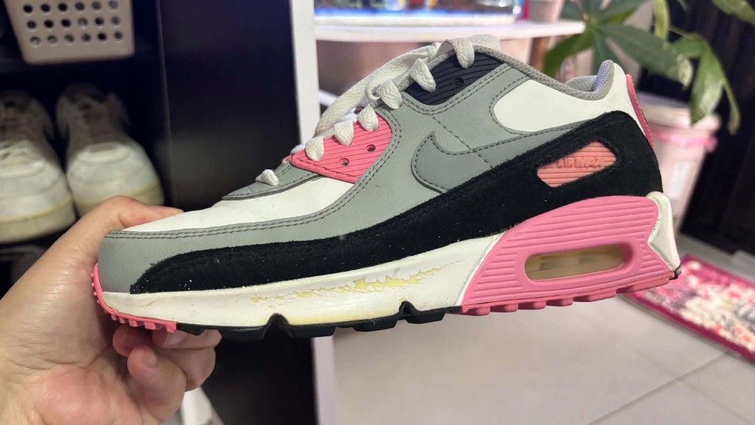 Nike Air Max 90 Pink Grey Black White (Category: Sneakers) located in Muntinlupa City. Submitted by margarita97 (Listing ID 1444790041, Image 3). Description: - Nike Air Max 90 sneakers - Colorway: Pink, grey, black, and white - Features the iconic visible Air unit - Classic and versatile design - Minor scuff marks on the midsole, but plenty of life left - Perfect for everyday casual wear.