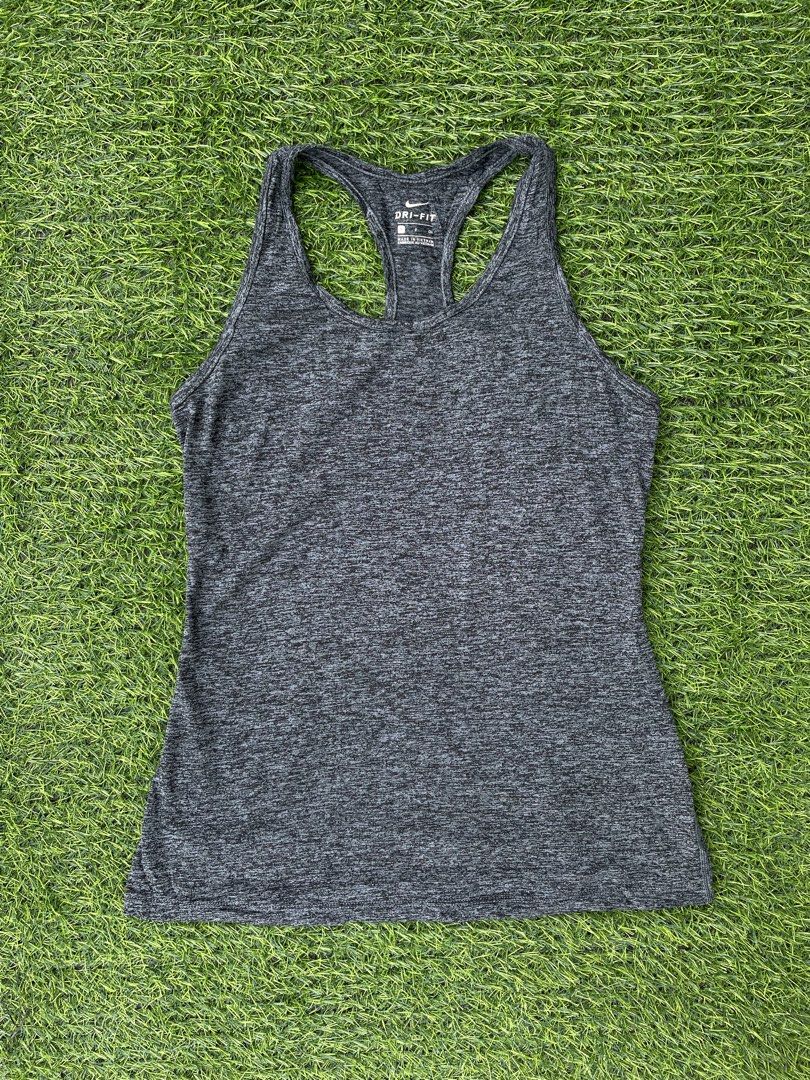 Nike Dri-FIT Racerback Tank Top (Category: Activewear) located in Bacolod City. Submitted by maxpeynthrift (Listing ID 1444683706, Image 1). Description: Size Small W 15 L 24 Excellent condition No issue Technology: Dri-FIT high-performance microfiber polyester Design: Scoop neck with classic T-shaped racerback straps for maximum shoulder mobility Material Composition: 100% Recycled Polyester knit fabric Color: Charcoal Heather Gray / Space Dye p