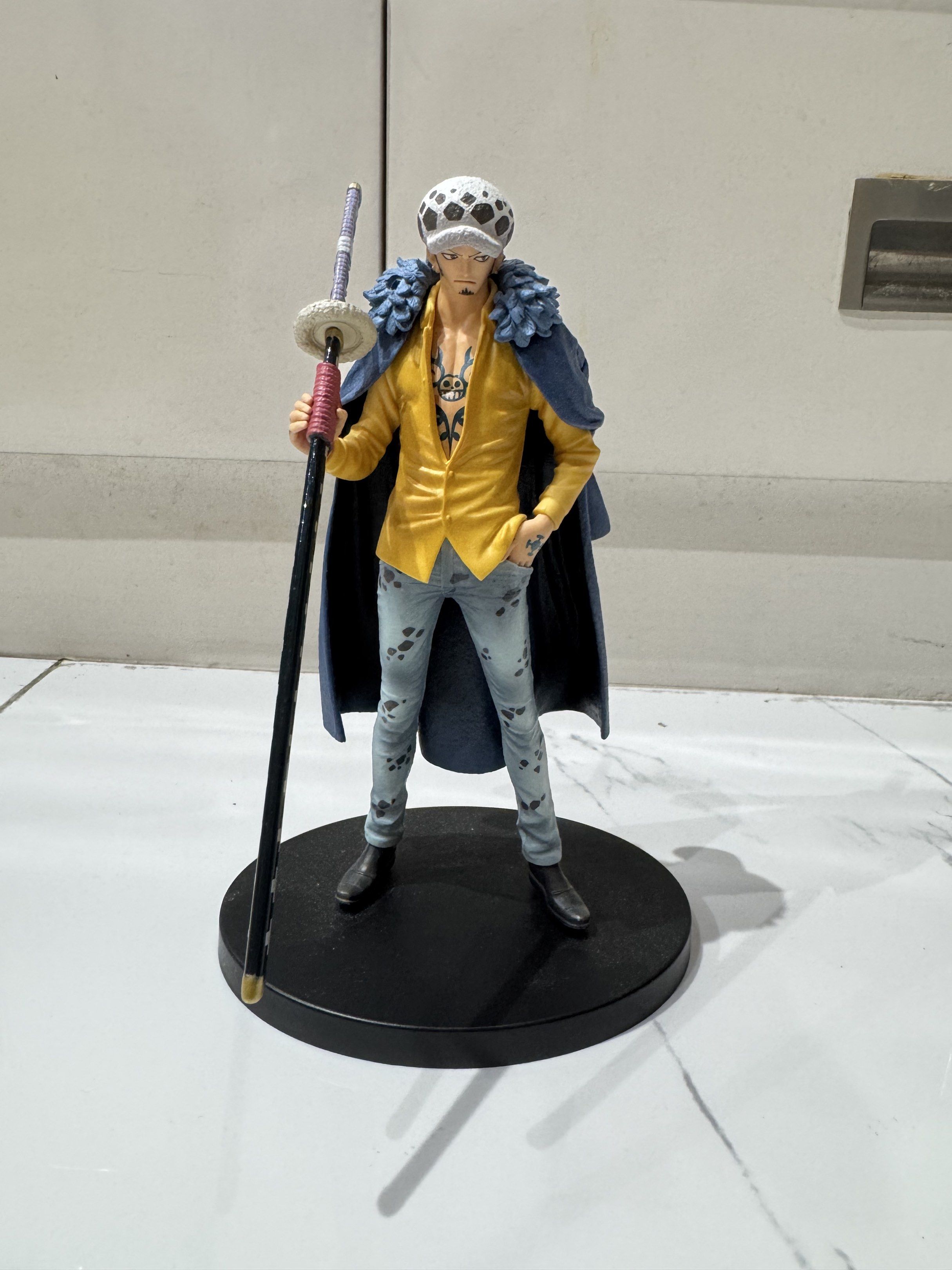 One Piece Trafalgar Law Action Figure Bandai Spirits NO BOX (Category: Figurines & Statues) located in Manila. Submitted by milleshoppppp (Listing ID 1444835733, Image 1). Description: - Trafalgar Law action figure from One Piece - Made by Bandai Spirits - Includes a black display base - Figure is holding a sword - Ideal for any One Piece fan's collection - First owner - only used for display.