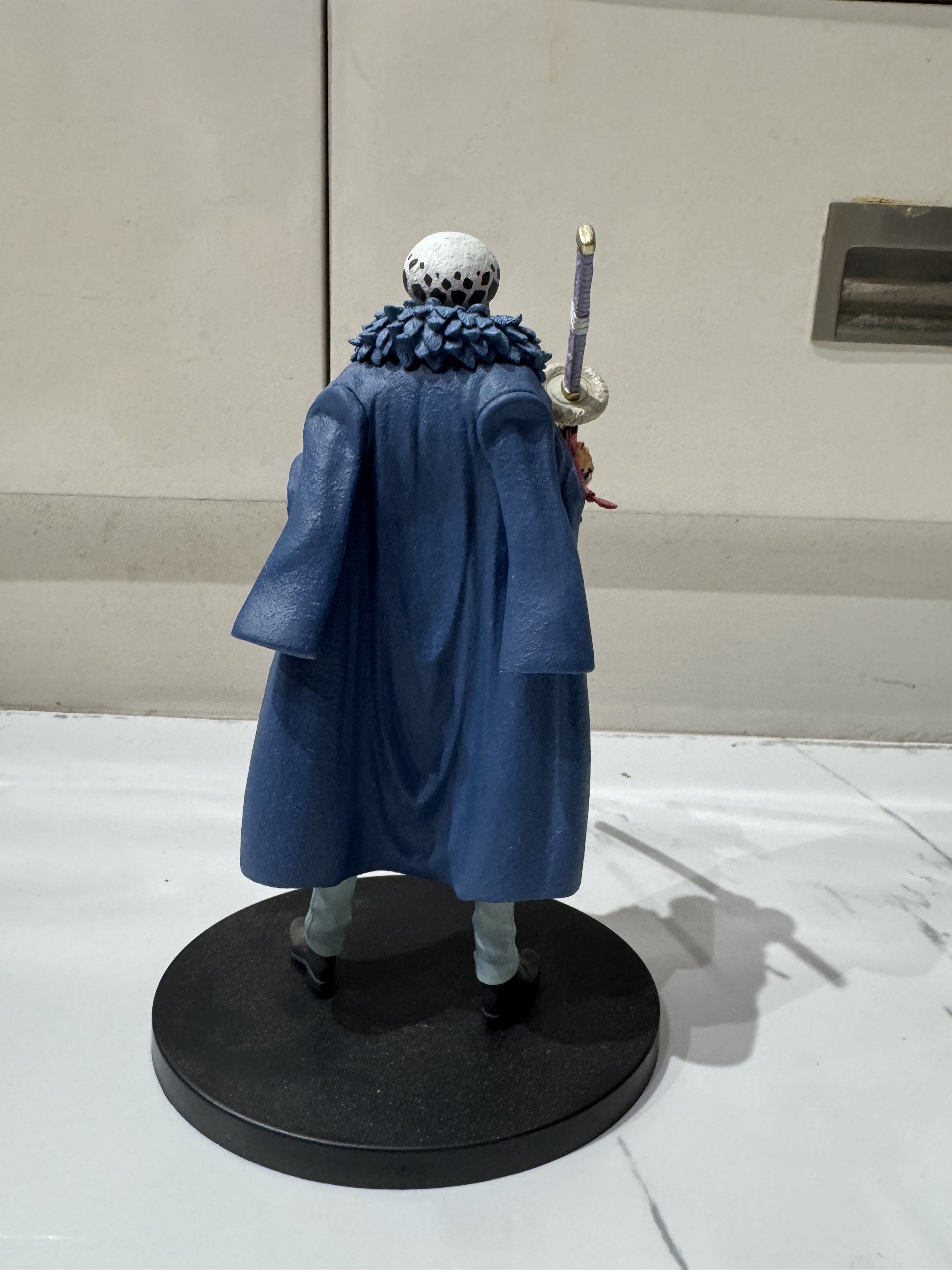 One Piece Trafalgar Law Action Figure Bandai Spirits NO BOX (Category: Figurines & Statues) located in Manila. Submitted by milleshoppppp (Listing ID 1444835733, Image 2). Description: - Trafalgar Law action figure from One Piece - Made by Bandai Spirits - Includes a black display base - Figure is holding a sword - Ideal for any One Piece fan's collection - First owner - only used for display.
