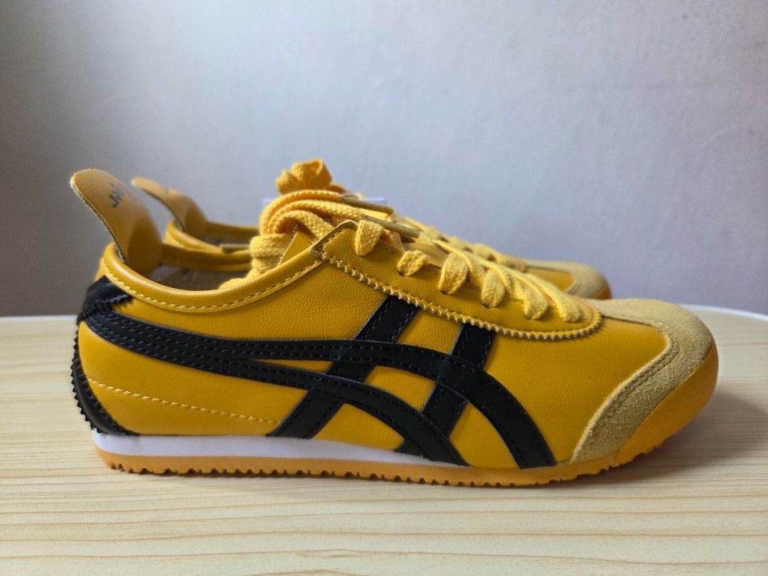 Onitsuka Tiger Mexico 66 Yellow Black Sneakers (Category: Sneakers) located in Singapore. Submitted by ronnyhoong8 (Listing ID 1444810737, Image 3). Description: - Classic Onitsuka Tiger Mexico 66 - Color: Yellow/Black - Size: Women's US 6 , EUR 37 , 23 CM - Includes original box - Suitable for casual wear or sports.