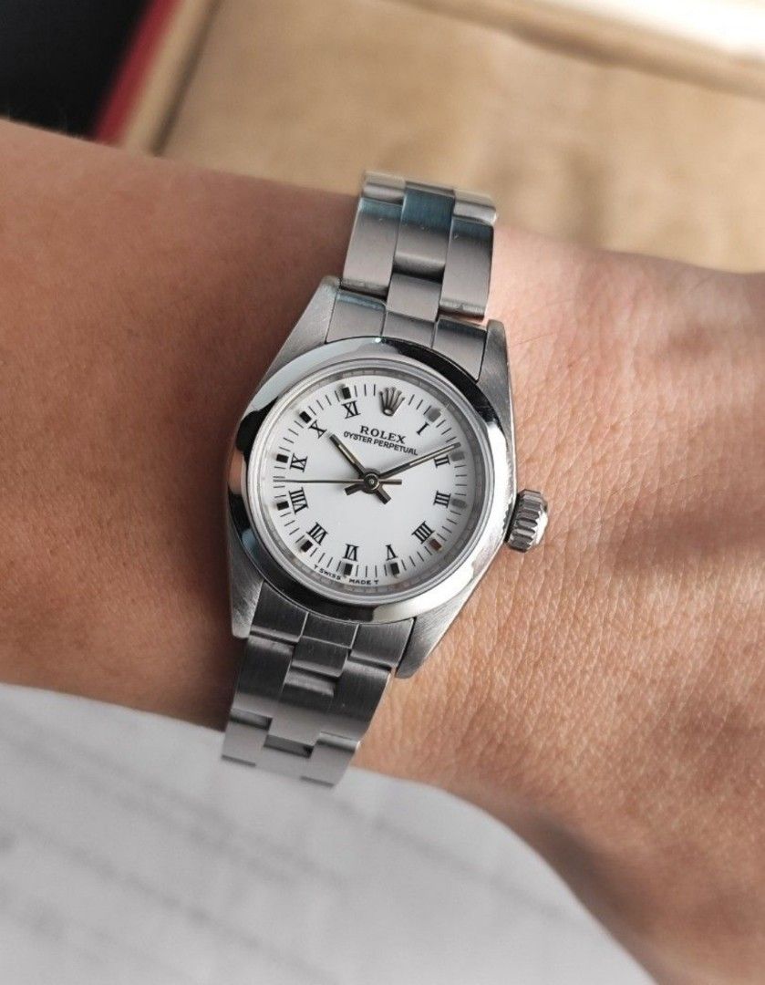 Original Rolex Oyster Perpetual 25mm (Category: Luxury Watches) located in San Juan City. Submitted by exclusivelyours (Listing ID 1444816579, Image 3). Description: Rolex Oyster Perpetual 25mm Roman white dial Ref 67180 W serial, 1995 9/10 condition Inclusions: watch, original bracelet fit to approx 6.8" wrist size, official receipt dated 1995, Rolex service center receipt, Rolex guarantee certificate and watch pouch *photo reference on 6.5" wri