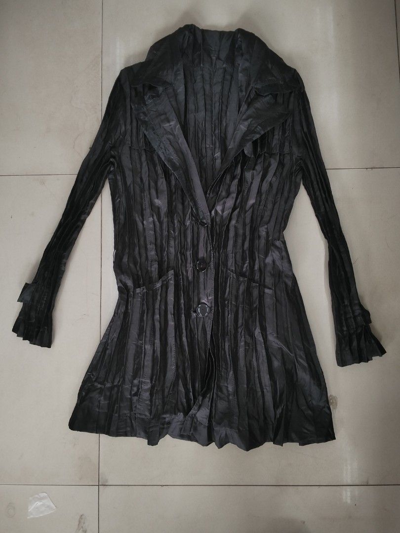 SPECCHIO PLEATS Jacket Dark Grey Pleated Button-Up (Category: Coats, Jackets and Outerwear) located in Zamboanga. Submitted by nurjimdigo71795 (Listing ID 1444742784, Image 1). Description: - Dark grey jacket from PECCHI PLEATS - Unique all-over pleated design - Button-up front with two pockets - Long sleeves with ruffled cuffs - Estimated size: 40 - Material: 100% polyester - Ideal for layering.