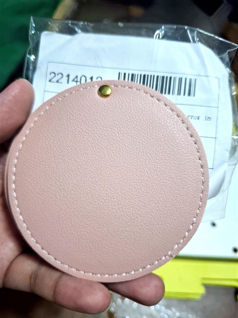 Pink Faux Leather Compact Mirror with Gold Button (Category: Mirrors) located in Quezon City. Submitted by an.marie (Listing ID 1444841612, Image 2). Description: Cute pink compact mirror with faux leather cover and gold button closure. Perfect for on-the-go touch-ups, fits easily in your bag. 8cm wide..