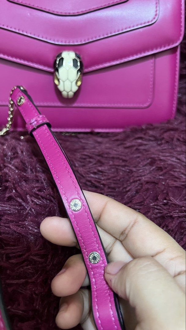 Pink Shoulder Bag with Snake Head Clasp (Category: Luxury Bags & Wallets) located in Muntinlupa City. Submitted by armendaber03743 (Listing ID 1444804421, Image 2). Description: - Stylish pink shoulder bag - Features a gold chain strap - Unique snake head clasp with enamel details - Adjustable strap with metal accents - Ideal for evening wear or adding a pop of color.