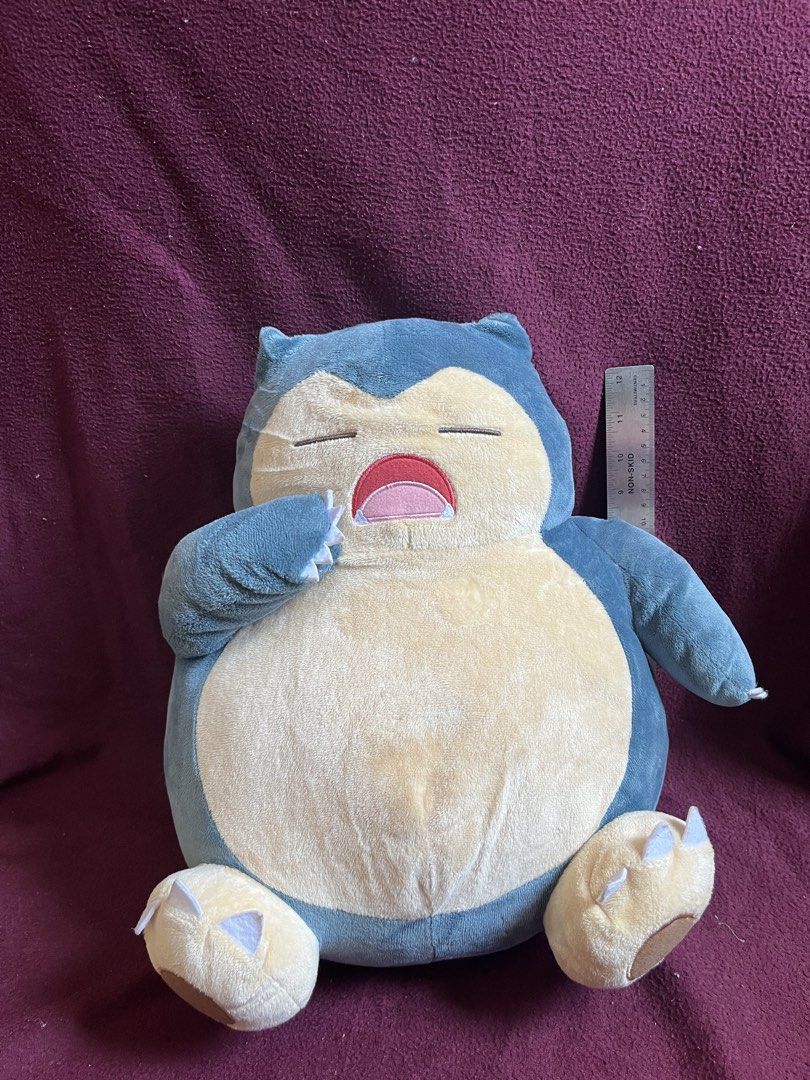 Pokemon Snorlax Plush Toy (Category: Plushies & Soft Toys) located in Baguio. Submitted by gaara1234 (Listing ID 1444685084, Image 1). Description: - Super cute Snorlax plush toy - Approximately 30-40cm in size - Features 'I LOVE KABIGON' tag - Soft and squishy texture - Ideal for Pokemon fans and collectors - Ready for a new home!.