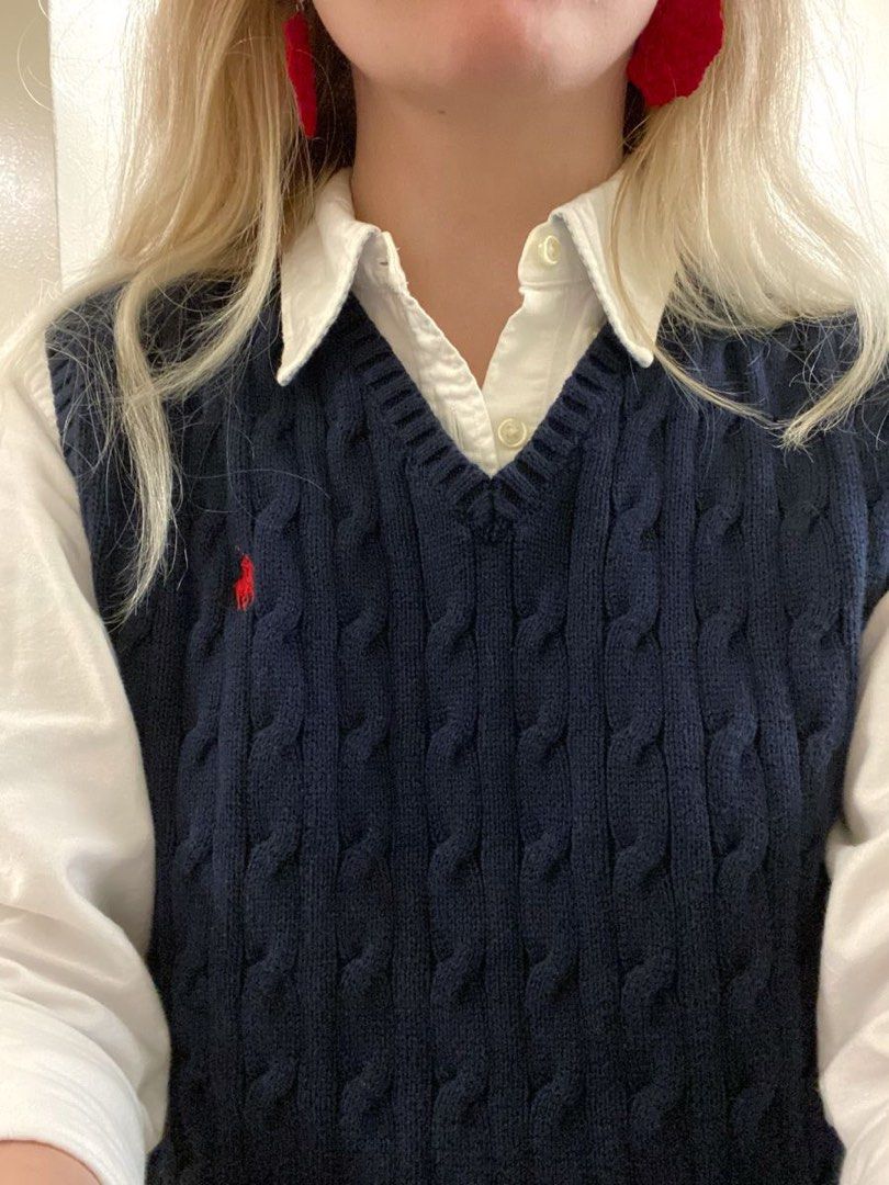 Polo Ralph Lauren Cable Knit Vest (Category: Sleeveless) located in Cavite. Submitted by declutterringggggg (Listing ID 1416787039, Image 2). Description: - Polo Ralph Lauren cable knit vest - Color: Navy blue - Size: 5 - Features V-neck - Sleeveless design - Classic cable knit pattern - Signature Polo logo - Great for layering - Like new only used few time - no flaws just the lighting message me if u need more pics.