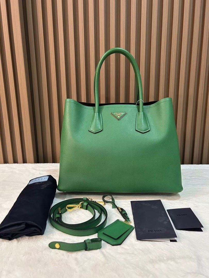 Pra da Saffiano Cuir Double Bag (Category: Luxury Bags & Wallets) located in Manila. Submitted by bagislifeshop (Listing ID 1444681665, Image 1). Description: ☑️Available in Pampanga ✅Condition: 8.8/10 ✅Colour: Green ✅Material: Saffiano leather ✅Inclusion: Dustbag, authenticity card, long strap and receipt .