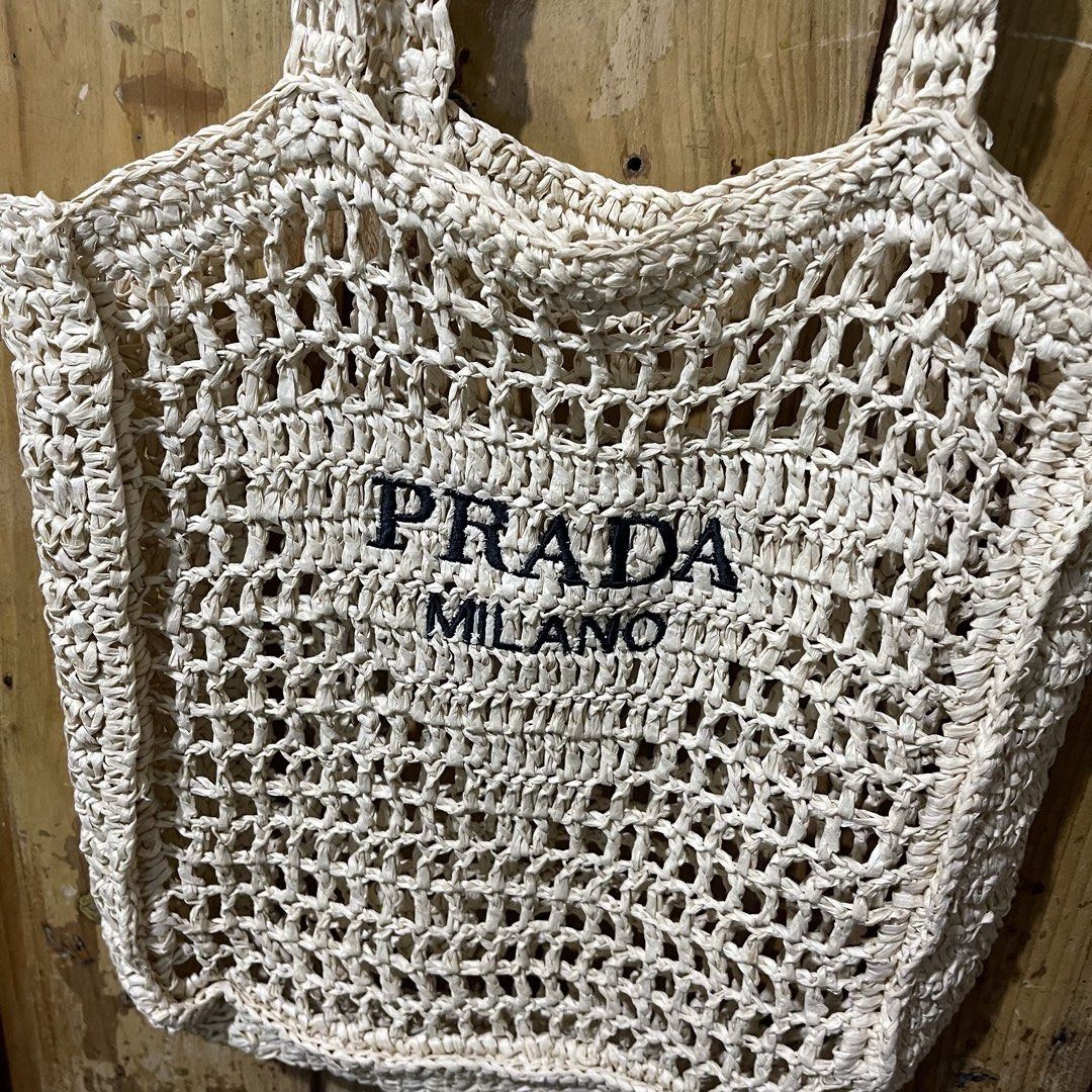 Prada Raffia Crochet Summer/Beach Tote Bag (Category: Luxury Bags & Wallets) located in Baguio. Submitted by goodfinds2600v2 (Listing ID 1444847746, Image 3). Description: Size: L Dimensions: L- W- Description: NGA Condition: Excellent Issue/s: No inside tags.