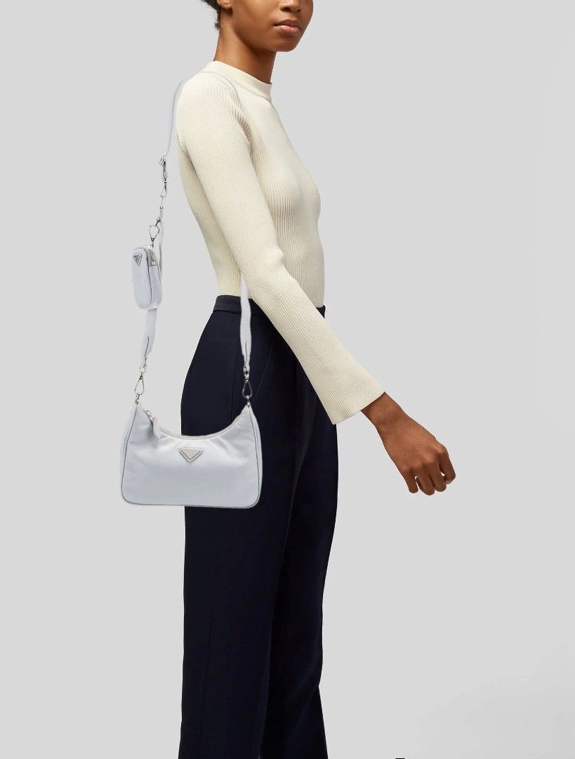 Prada Re-Edition 2000 Nylon Shoulder Bag Light Blue (Category: Luxury Bags & Wallets) located in Manila. Submitted by cleverhorse.0f3565 (Listing ID 1444837572, Image 1). Description: - Authentic light blue Prada shoulder bag - Durable nylon material - Comes with original pouch - Adjustable strap for comfort - Interior features Prada logo lining - Made in Italy - Ideal for everyday use.