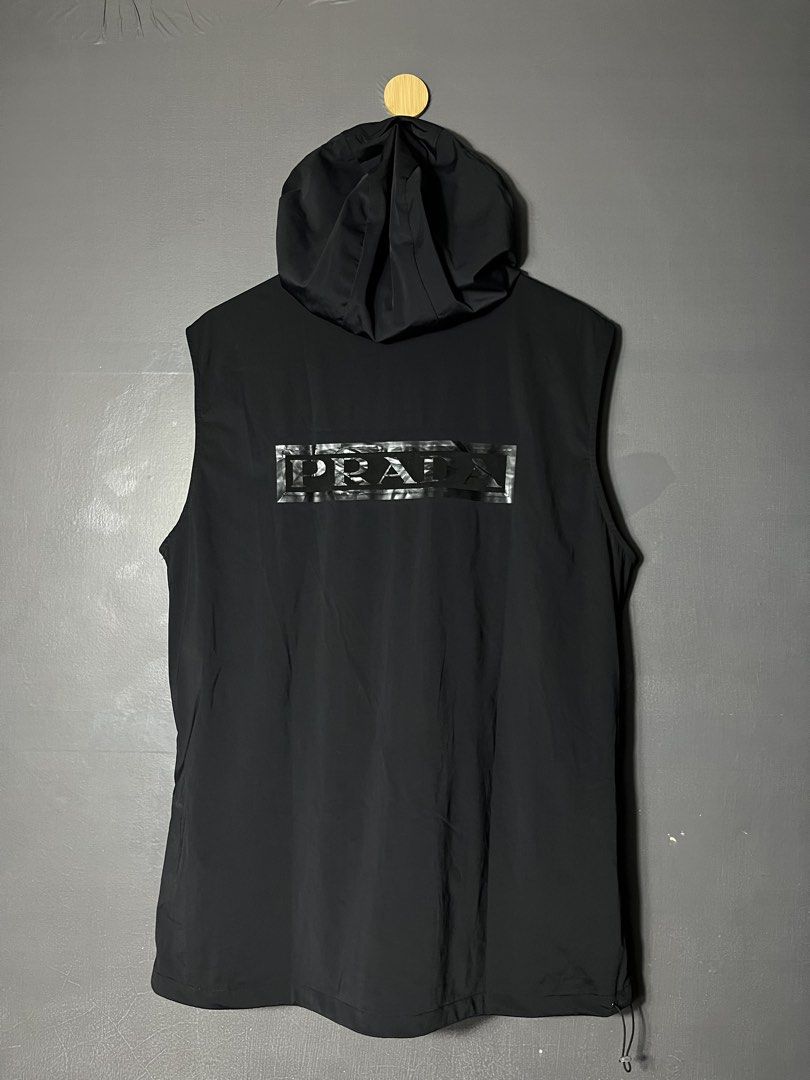 Prada Re-Nylon hooded vest (Category: Vests) located in Bacolod City. Submitted by piquedup.ph_v2 (Listing ID 1444849066, Image 3). Description: Prada Re-Nylon hooded vest Size: L | 22x28.5 Condition: Excellent Color rate: 9/10 (Color may vary to lighting) Flaws: None.