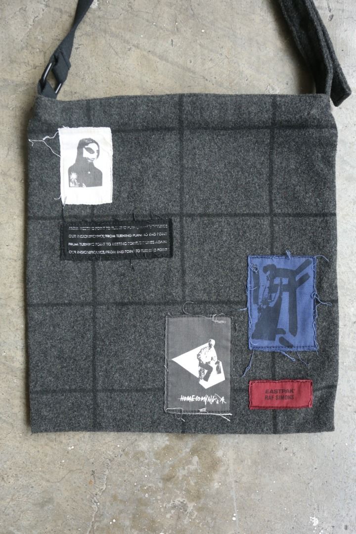 Raf Simons - Eastpak - F/W 08 - Patch Shoulder Bag (Category: Sling Bags) located in Manila. Submitted by graymatter_ (Listing ID 1444771212, Image 2). Description: Raf Simons - Eastpak - F/W 08 - Patch Shoulder Bag Condition: BN Material: Wool Zipper: YKK Made in: China Dimensions Height: 38.5cm Width: 34cm .