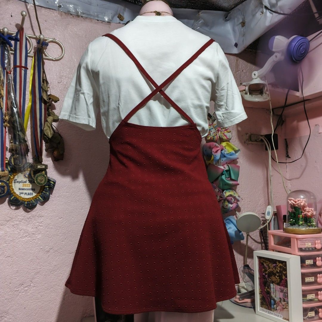 Red Suspender Dress with White Trim (Category: Dresses) located in Quezon City. Submitted by ysaai (Listing ID 1444688318, Image 2). Description: - note: Shirt not included, for photos only - Adorable red suspender dress - Textured fabric with a subtle dot pattern - Features white zigzag trim down the front - Straps cross elegantly at the back - Perfect for layering over a white tee for a fun, casual look - Easy to wear and style ‎📍 Location: Qu