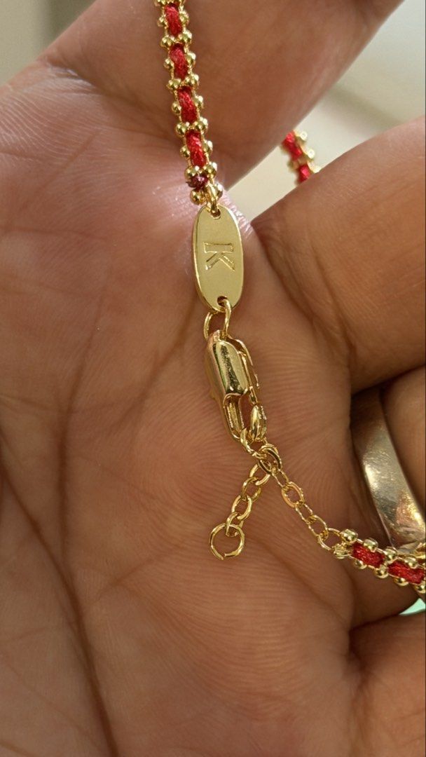 Redline braceler (Category: Luxury Accessories) located in Dasmarinas. Submitted by preloved_brandedbackup (Listing ID 1444692096, Image 2). Description: Bought in HK Plated Tried myself took 10 mos before fading. May take longer mos is you dont wet Adjustable .
