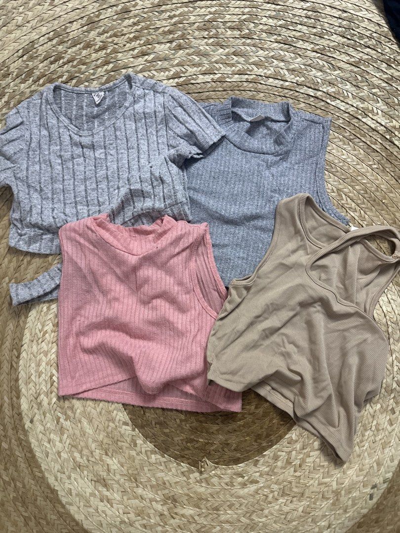 Shein Ribbed Crop Tops Bundle - Pink, Grey, Beige (Category: Babies & Kids Fashion) located in Tarlac. Submitted by relovedph_02 (Listing ID 1444747367, Image 1). Description: - Bundle of 4 ribbed crop tops - Includes: Grey long-sleeve tie-front, Grey mock neck sleeveless, Pink sleeveless, Beige racerback tank - Material: Soft and stretchy - Versatile: Great for layering or wearing on its own - Mix and match possibilities.