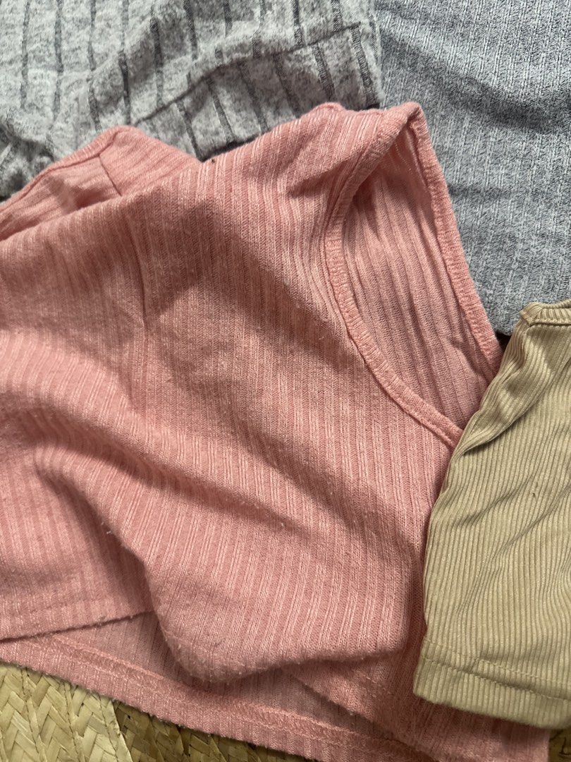 Shein Ribbed Crop Tops Bundle - Pink, Grey, Beige (Category: Babies & Kids Fashion) located in Tarlac. Submitted by relovedph_02 (Listing ID 1444747367, Image 3). Description: - Bundle of 4 ribbed crop tops - Includes: Grey long-sleeve tie-front, Grey mock neck sleeveless, Pink sleeveless, Beige racerback tank - Material: Soft and stretchy - Versatile: Great for layering or wearing on its own - Mix and match possibilities.