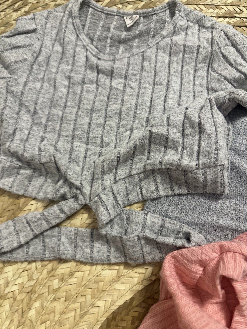 Shein Ribbed Crop Tops Bundle - Pink, Grey, Beige (Category: Babies & Kids Fashion) located in Tarlac. Submitted by relovedph_02 (Listing ID 1444747367, Image 2). Description: - Bundle of 4 ribbed crop tops - Includes: Grey long-sleeve tie-front, Grey mock neck sleeveless, Pink sleeveless, Beige racerback tank - Material: Soft and stretchy - Versatile: Great for layering or wearing on its own - Mix and match possibilities.