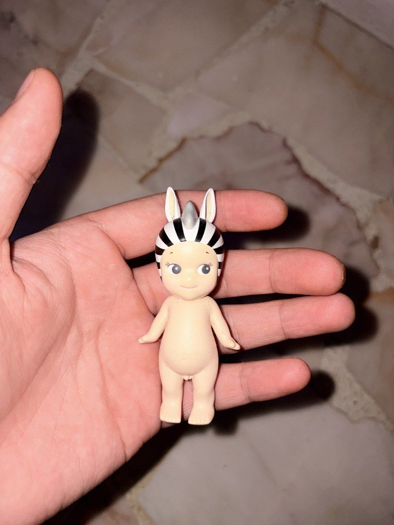 Sonny Angel Birthday & Zebra Figures (Category: Designer & Blind Box Toys) located in Singapore. Submitted by skibididobdobdob (Listing ID 1444725161, Image 2). Description: ‼️Selling each at $12, Both for $20‼️ Both babies looking for a new home. - Selling 2 Sonny Angel collectible figures. - Design 1: Birthday Cake with 'Happy Birthday' text. - Design 2: Zebra print. - Ideal for display or as a gift. - Grab both today!.