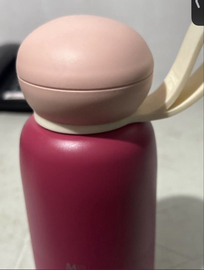 Sunries Water Bottle with Strap - Pink and Red (Category: Water Bottles & Tumblers) located in Pasay City. Submitted by pauulaa (Listing ID 1444767606, Image 3). Description: Rfs: hindi na nagagamit Issue: may letter na naka engrave and small dents.