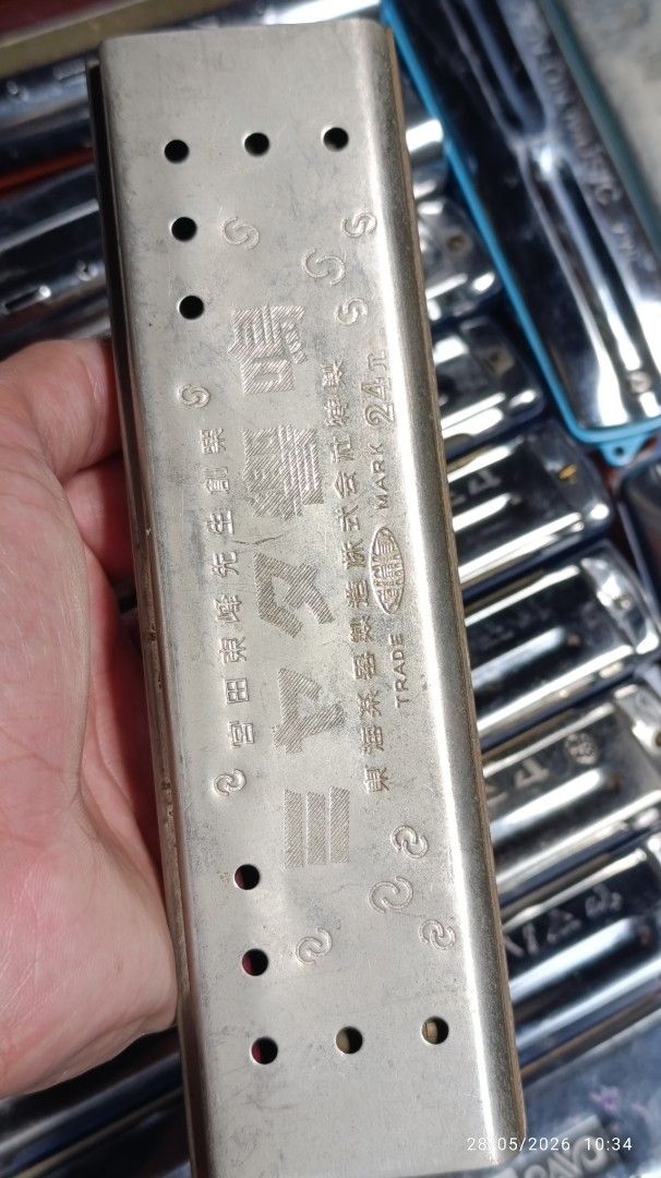 Suzuki Tremolo Harmonica 24 Holes (Category: Musical Instruments) located in Quezon City. Submitted by manyigorot33447 (Listing ID 1444792008, Image 2). Description: - Suzuki Manji 24-hole tremolo harmonica - Made in Japan - Ideal for blues and folk music - Comes with a metal case - Case has minor wear, but harmonica plays well.