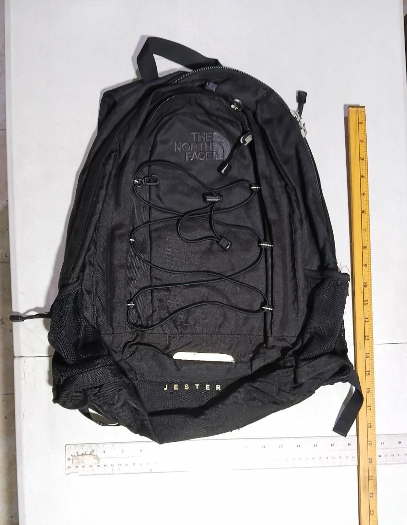 The North Face Jester Backpack Black (Category: Backpacks) located in Marikina City. Submitted by my-an (Listing ID 1444816155, Image 2). Description: Black The North Face Jester backpack Model: Jester (Classic Bungee Layout) Authenticity Code: AF9V001-OS / RN 61661 (Internal security tags intact) Front bungee cord storage, dual mesh water bottle pockets, comfortable padded back panel, and a spacious main compartment with a built-in protective la