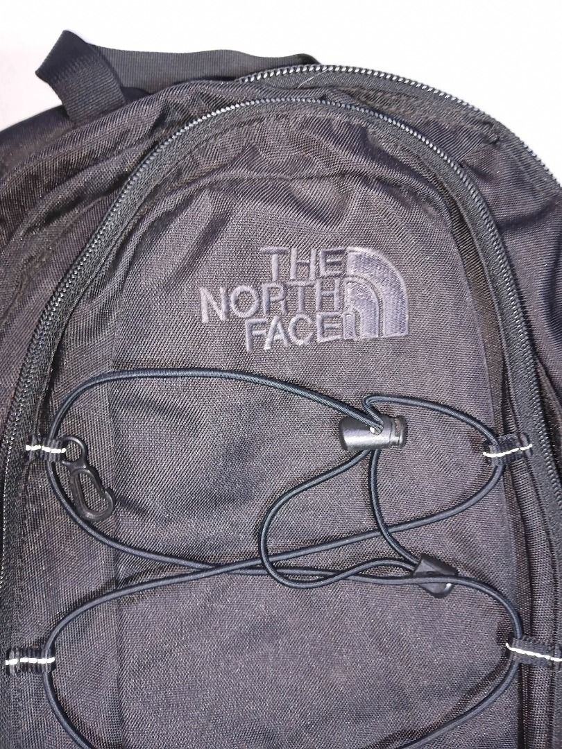 The North Face Jester Backpack Black (Category: Backpacks) located in Marikina City. Submitted by my-an (Listing ID 1444816155, Image 1). Description: Black The North Face Jester backpack Model: Jester (Classic Bungee Layout) Authenticity Code: AF9V001-OS / RN 61661 (Internal security tags intact) Front bungee cord storage, dual mesh water bottle pockets, comfortable padded back panel, and a spacious main compartment with a built-in protective la