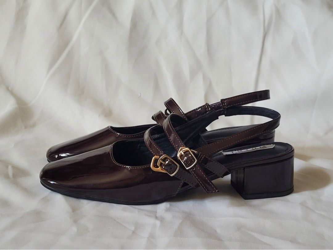 TUTUM Plum Mary Jane Heels (Category: Heels) located in Manila. Submitted by itscially (Listing ID 1444733397, Image 2). Description: Condition: Like new overall, no flaws Details: - Size: US 7 - Color: Plum - Style: Patent material, square toe, slingback, double front buckle straps, low block heel design - Heel height: ~1 - 1.5 inches - No box - Perfect for dressing up or down - Great for work or a casual outing RFS: Decluttering Price: 549 (sli