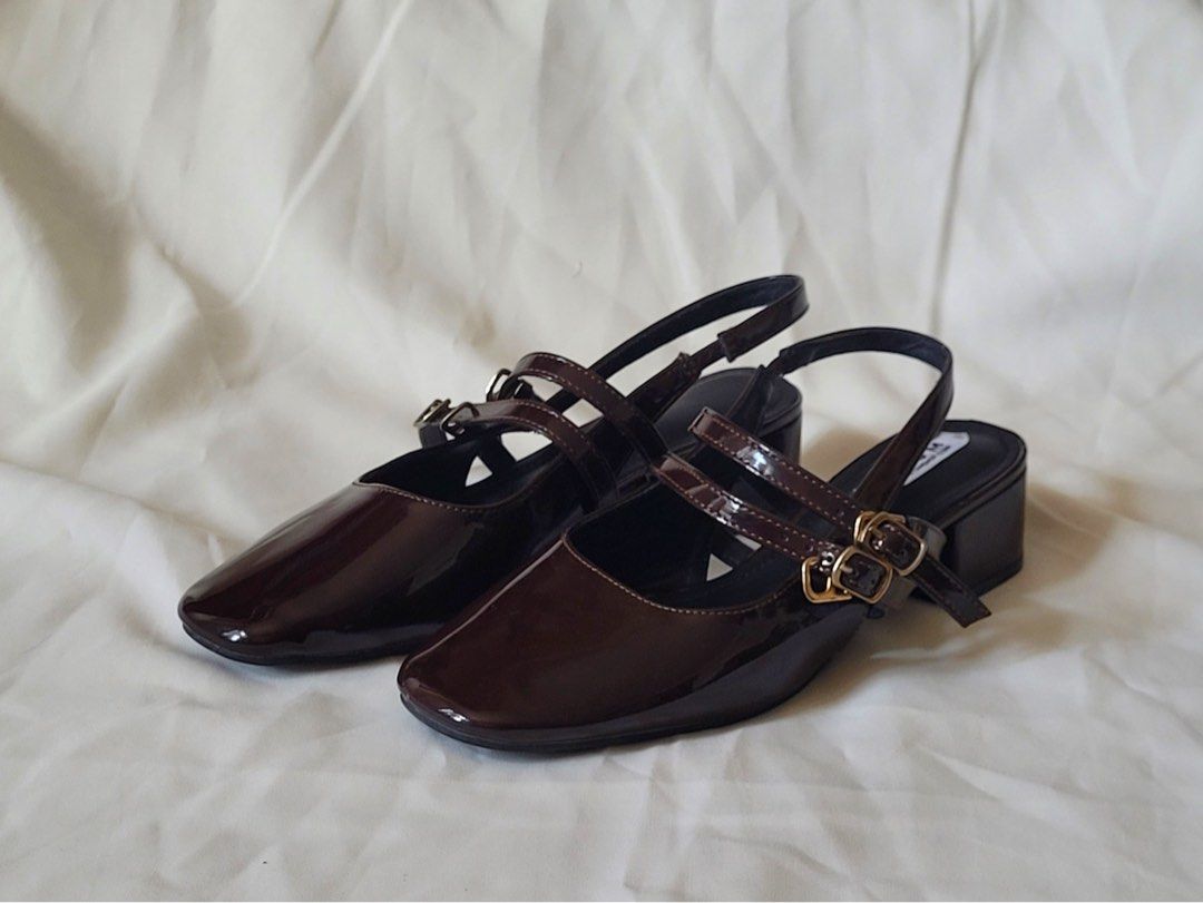 TUTUM Plum Mary Jane Heels (Category: Heels) located in Manila. Submitted by itscially (Listing ID 1444733397, Image 1). Description: Condition: Like new overall, no flaws Details: - Size: US 7 - Color: Plum - Style: Patent material, square toe, slingback, double front buckle straps, low block heel design - Heel height: ~1 - 1.5 inches - No box - Perfect for dressing up or down - Great for work or a casual outing RFS: Decluttering Price: 549 (sli