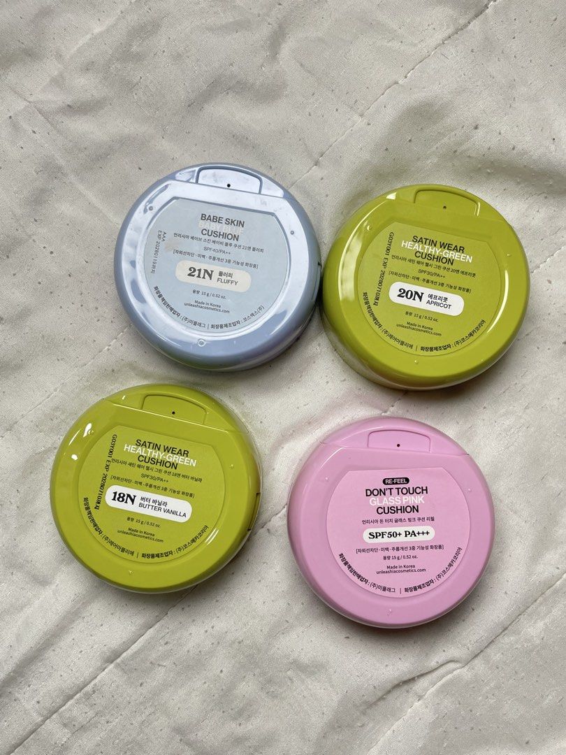 Unleashia Cushion Foundation Set (4 shades) (Category: Makeup) located in Abucay. Submitted by declutterwyana (Listing ID 1444774319, Image 2). Description: - Unleashia Cushion Foundations for sale! - Available shades & types: - Babe Skin Cushion: 21N Nuffy - Satin Wear Cushion: 20N Apricot - Satin Wear Cushion: 18N Butter Vanilla - Don't Touch Cushion: SPF50+ PA+++ - Perfect for various skin tones and desired finishes. - ₱350 each.