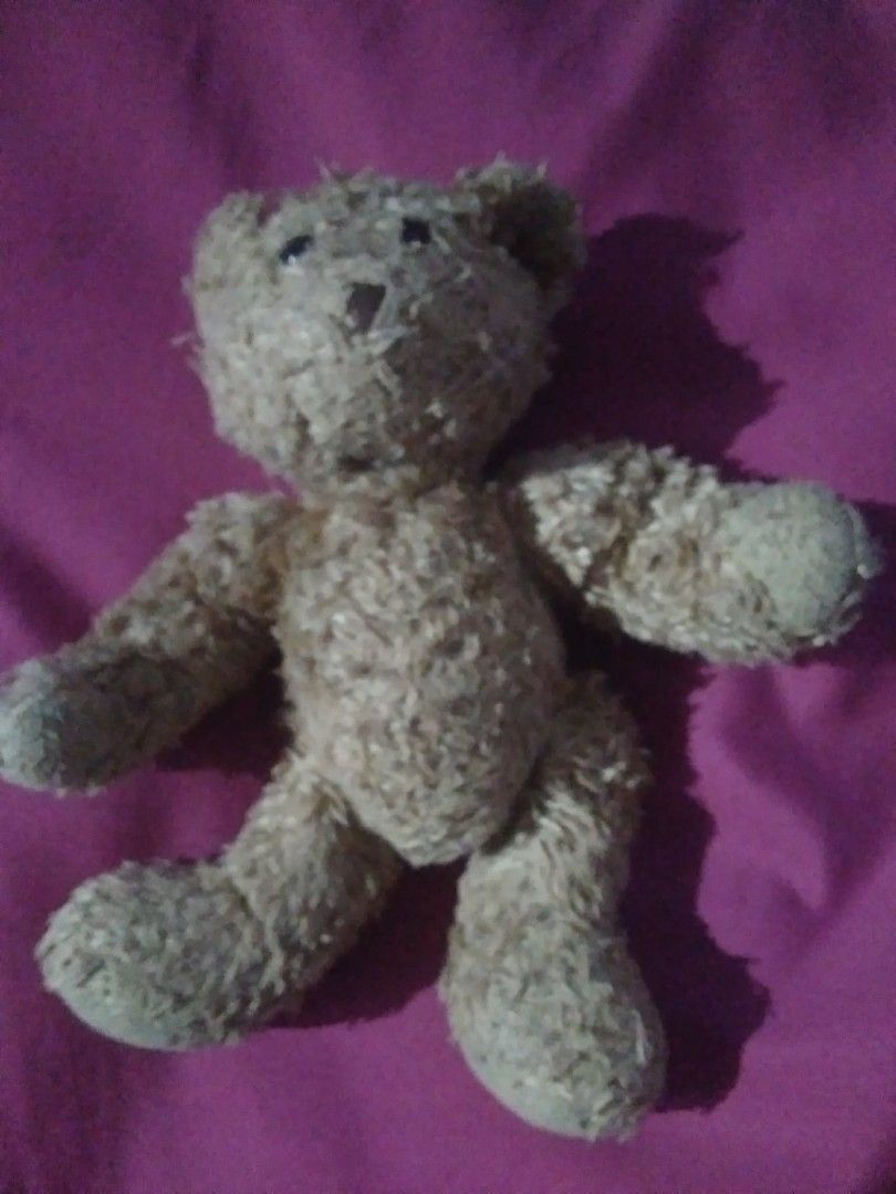 Vintage Brown Teddy Bear Plush Toy (Category: Plushies & Soft Toys) located in Marikina City. Submitted by norman213 (Listing ID 1444839559, Image 1). Description: - Cute brown teddy bear - Soft and cuddly texture - Has a unique, slightly worn look that adds character - Perfect for kids, as a gift, or for teddy bear collectors - Ready to find a new loving home.