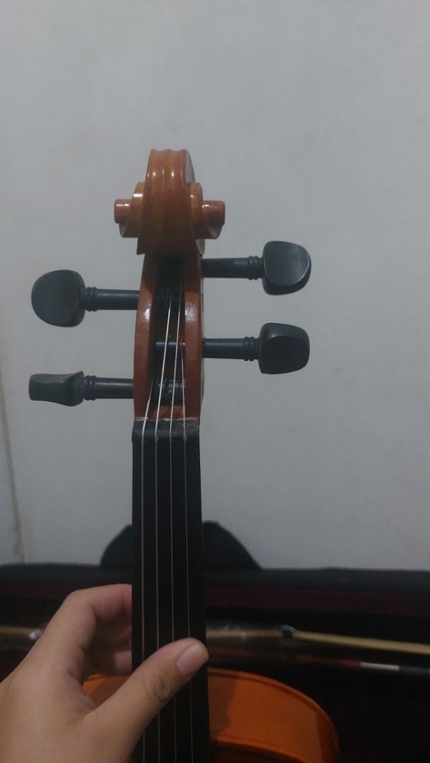 Viola with Case and Bows (Category: Musical Instruments) located in Makati City. Submitted by ghatchie (Listing ID 1444764632, Image 2). Description: - Beautiful wood finish viola - Black tuners - Perfect for beginners and intermediate players - Comes with a case (dark red interior) - Includes two bows - Ready to play.