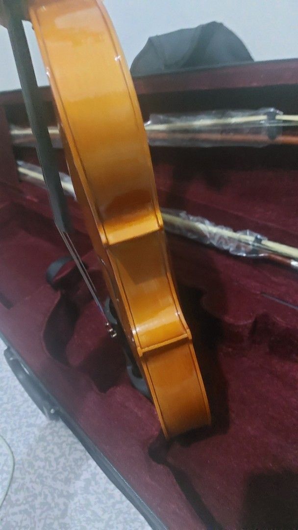 Viola with Case and Bows (Category: Musical Instruments) located in Makati City. Submitted by ghatchie (Listing ID 1444764632, Image 3). Description: - Beautiful wood finish viola - Black tuners - Perfect for beginners and intermediate players - Comes with a case (dark red interior) - Includes two bows - Ready to play.