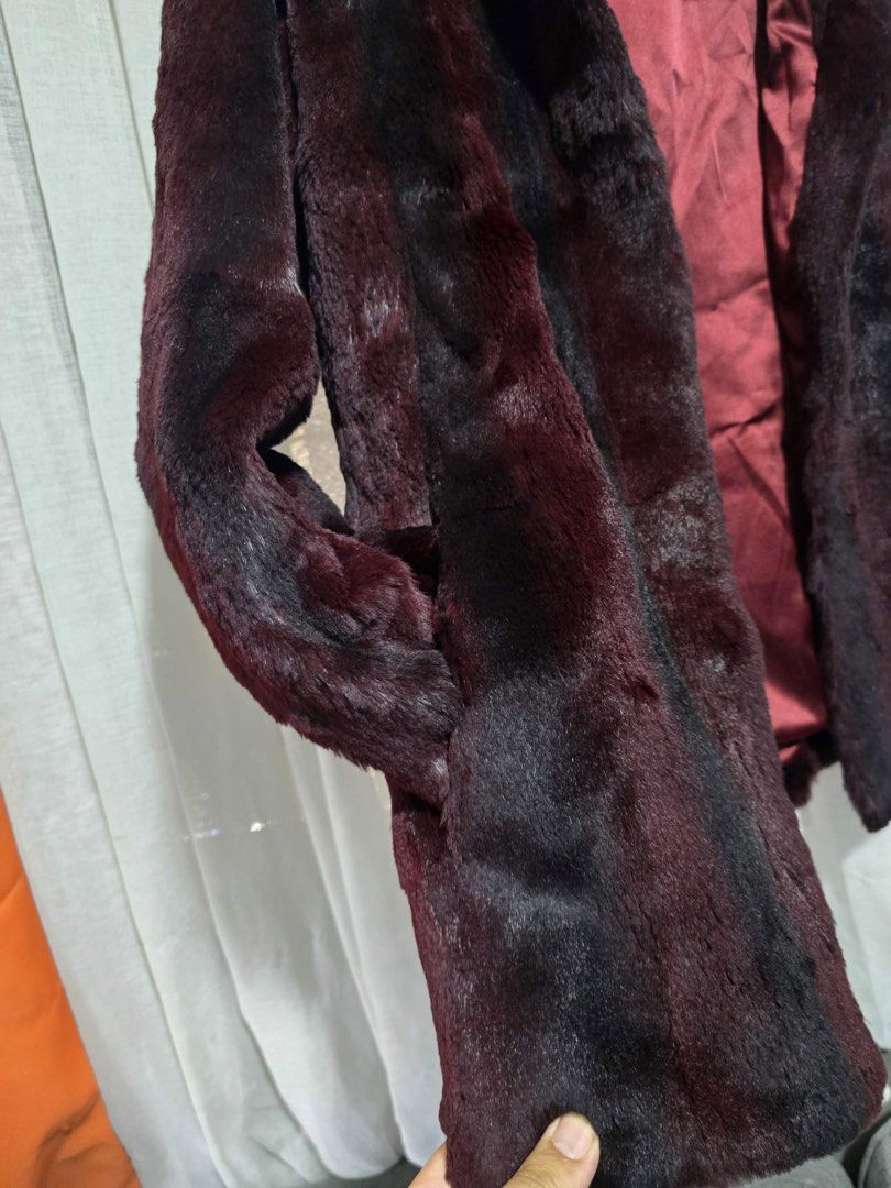 VOCALISE Faux Fur Coat (Category: Coats, Jackets and Outerwear) located in Baguio. Submitted by chebaguio06 (Listing ID 1444773645, Image 3). Description: Vocalise Faux Fur Coat . Size: Medium . Measurement: W19” x L28” . Color: Burgundy/ Maroon Ombre . Material: Ultra soft plush Faux fur . Features: Classic collar, hidden snap closure, smooth inner lining In very good condition From Korean Box Newly Open.