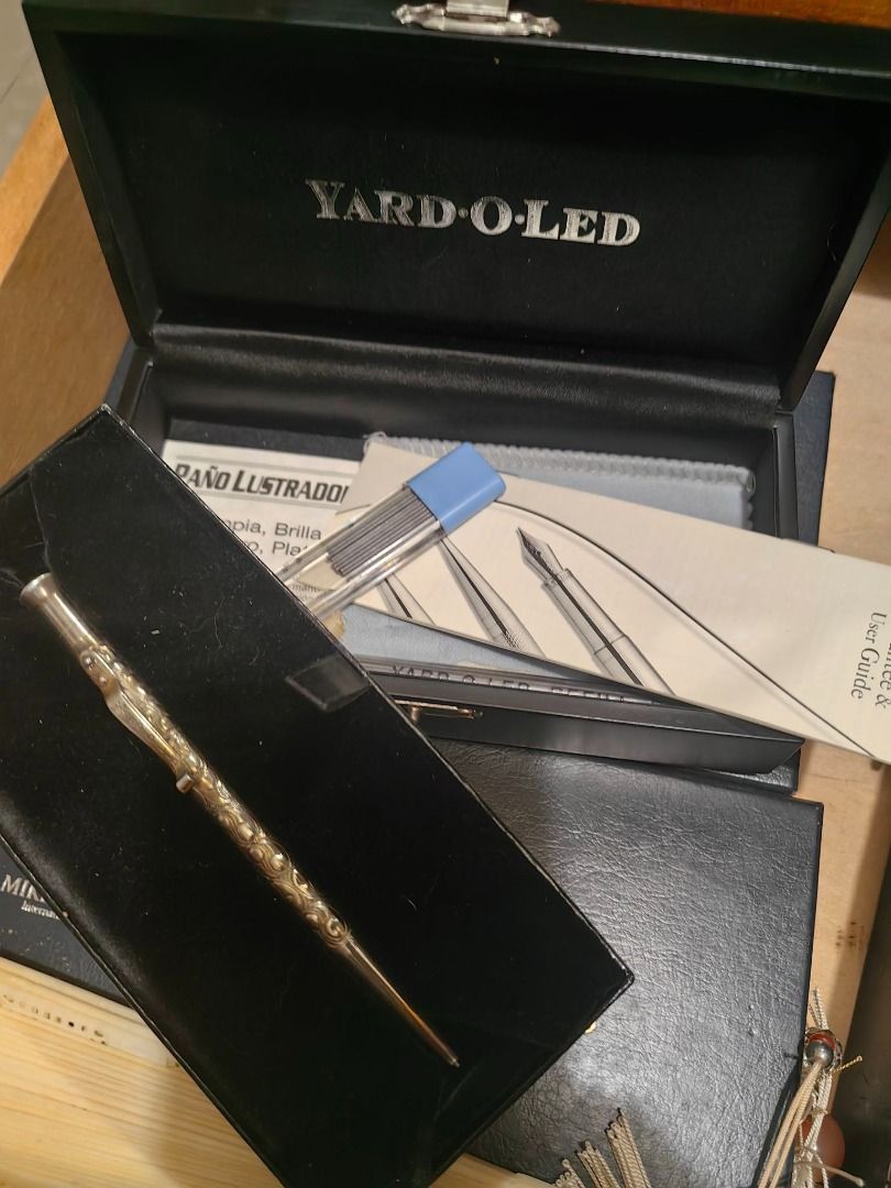 Yard-O-Led Mechanical Pencil with Box and Accessories (Category: Stationery & School Supplies) located in Davao. Submitted by thefrugalshop (Listing ID 1444852025, Image 1). Description: - Yard-O-Led mechanical pencil - Original box included - Comes with lead refills - Includes polishing cloth - Features an ornate, patterned design - A beautiful writing instrument.