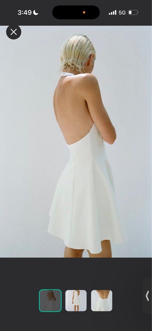 ZARA White Halter Neck Mini Dress (Category: Dresses) located in Buguey. Submitted by ocloset0324 (Listing ID 1444747898, Image 1). Description: - White halter neck mini dress - Fitted bodice with a flared skirt - Backless design - Simple and chic style - Ideal for parties or events.