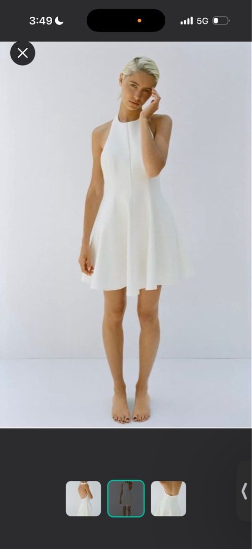 ZARA White Halter Neck Mini Dress (Category: Dresses) located in Buguey. Submitted by ocloset0324 (Listing ID 1444747898, Image 2). Description: - White halter neck mini dress - Fitted bodice with a flared skirt - Backless design - Simple and chic style - Ideal for parties or events.
