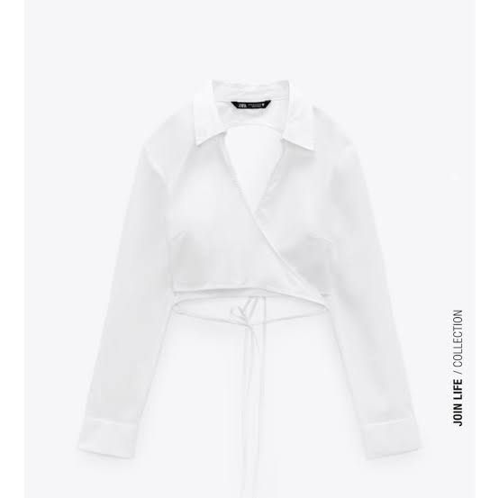 Zara White Open Back Tie Up Cropped Shirt (Category: Shirts) located in Santa Rosa. Submitted by 07mkl (Listing ID 1444684513, Image 2). Description: • Size: S-M • Condition: 9/10 • Flaws: none • Color: white ₱150✨.