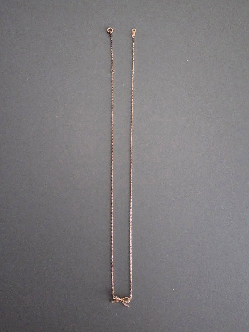 10K Rose Gold Dainty Bow Natural Diamond Necklace (Category: Necklaces) located in Makati City. Submitted by Gkyutie (Listing ID 1441491245, Image 2). Description: This delicate and feminine design is adorned with natural diamonds,making it perfect for everyday wear.✨️✨️ Japan gold. Length 40cm.