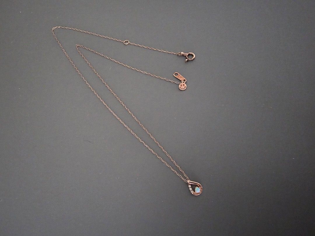 10K Rose Gold Natural Opal + Diamond Dainty Necklace (Category: Necklaces) located in Makati City. Submitted by Gkyutie (Listing ID 1441483286, Image 3). Description: This dainty necklace is lovely and delicate.A small round opal sparkles beautifully with diamonds in a delicate 10K gold setting. Japan gold. Length 40cm.