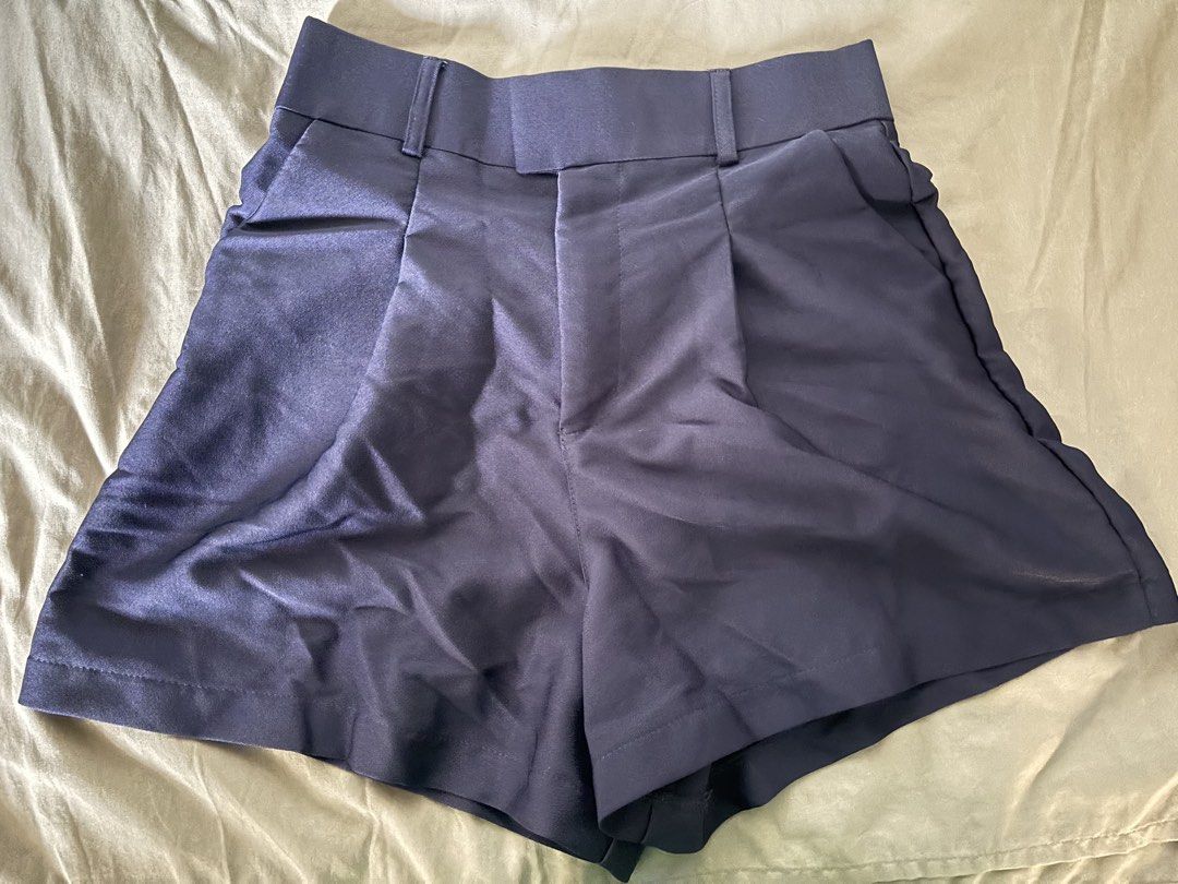 150 each - High Waisted Pleated Shorts (Category: Shorts) located in Manila. Submitted by shaievan (Listing ID 1441471062, Image 1). Description: - High-waisted shorts from Candy - Features a stylish pleated front - Belt loops for added versatility - Available colors: Navy Blue and White - Size: Medium - Ideal for casual outings or dressing up - 150 each - can fit 26-27.