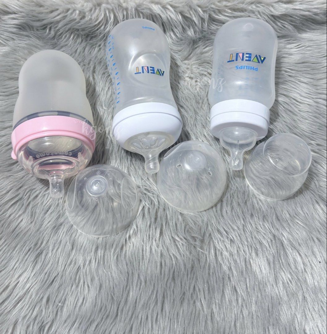 2x Philips Avent & Comotomo Baby Bottles (Category: Breastfeeding & Bottle Feeding) located in Rodriguez. Submitted by kgonzales07 (Listing ID 1441411633, Image 2). Description: ✨ DECLUTTERING SALE! ✨ UNUSED Feeding Bottle BUNDLE 💯 Authentic 🏷️ ₱1,800 ONLY Condition: Never used. Baby is breastfed. What's included: - 2 Philips Avent bottles (9oz each) - 1 Comotomo Pink bottle (8oz) ✔️ All bottles come with teats and caps ✅ First to pay, first to
