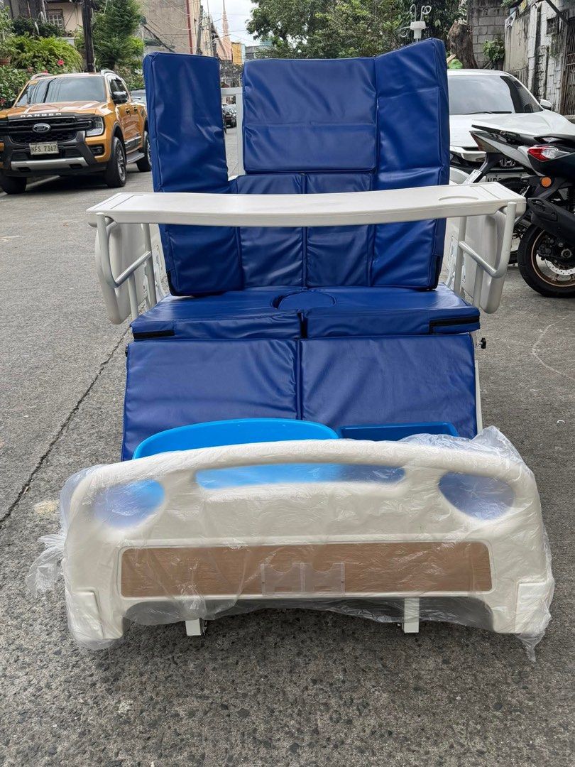 7Function Electric Bed (Category: Medical Supplies & Tools) located in Manila. Submitted by rosel2001 (Listing ID 1441446409, Image 3). Description: - Adjustable hospital bed for comfort and support. - Includes a comfortable mattress with a hygiene cutout. - Detachable tray for convenient meal times or activities. - Safety side rails for added security. - Wheels for easy maneuverability around the room. - Ready for immediate use..