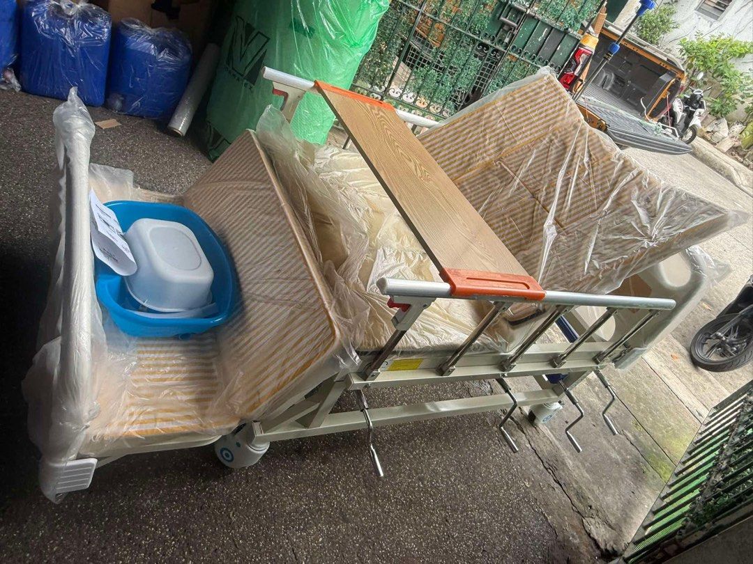 7Function Manual Bed (Category: Bed Frames & Mattresses) located in Manila. Submitted by rosel2001 (Listing ID 1441446021, Image 1). Description: - Manual hospital bed - Adjustable backrest and leg rest - Comes with mattress and bedside basin - Equipped with wheels for easy mobility - Crank handles for effortless adjustments - Suitable for home care or medical facilities - Ready for pickup.