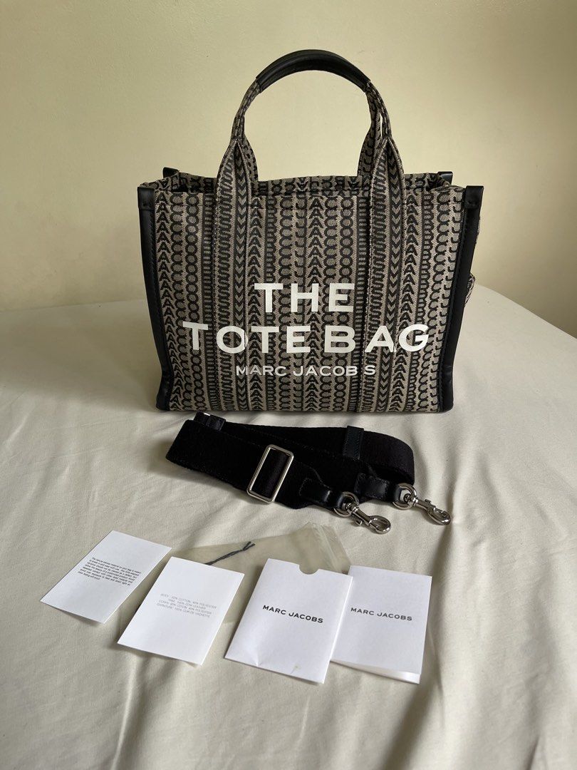💯 Authentic Marc Jacobs The Tote Bag Medium in Jacquard Monogram (Category: Luxury Bags & Wallets) located in Makati City. Submitted by eucccuy (Listing ID 1441395566, Image 1). Description: Decluttering! 💯 Authentic Marc Jacobs The Tote Bag -Medium Size -with strap, care cards, and paper bag -lost dustbag Jacquard Monogram with Genuine Leather Trims Used mostly during travels only Bought locally at GB Price slightly nego DM for queries!.