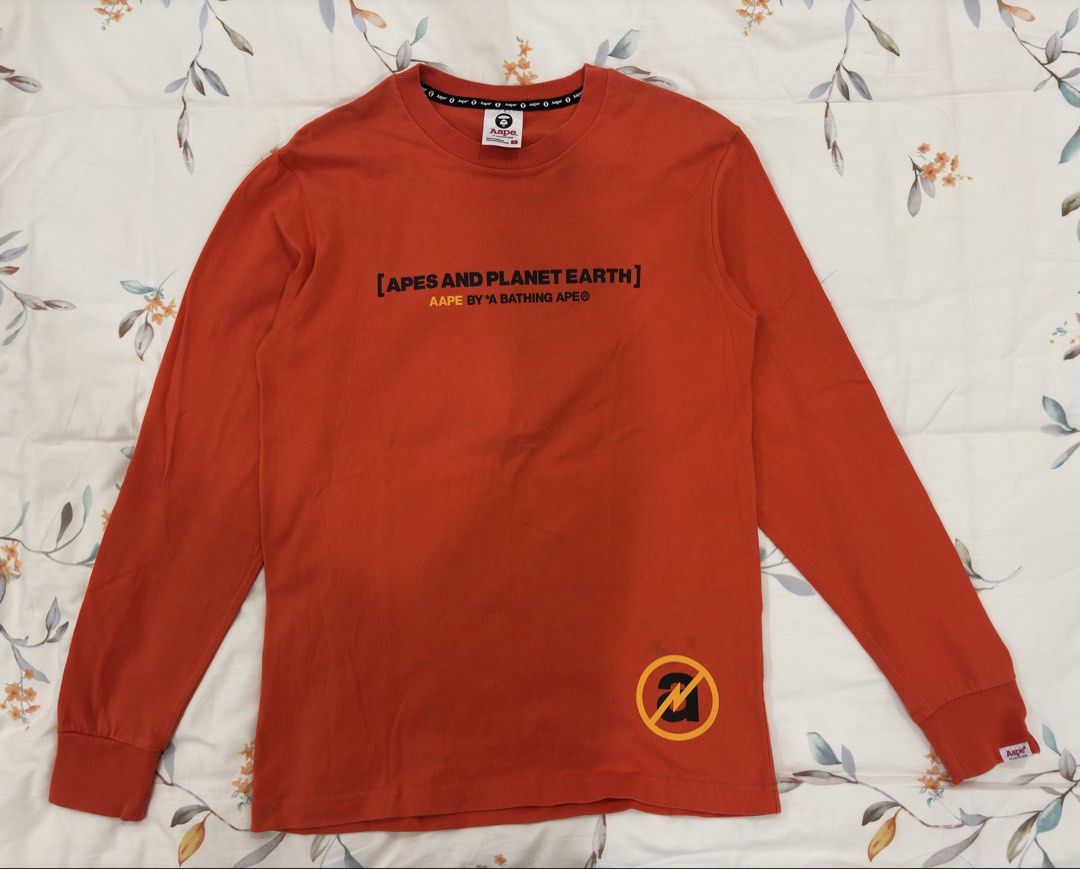 AAPE by A Bathing Ape Orange Long Sleeve Tee (Category: Tshirts & Polo Shirts ) located in Caloocan City. Submitted by foundagain (Listing ID 1441531398, Image 1). Description: size S used twice rfs decluttering payment first before shipping (gcash) .