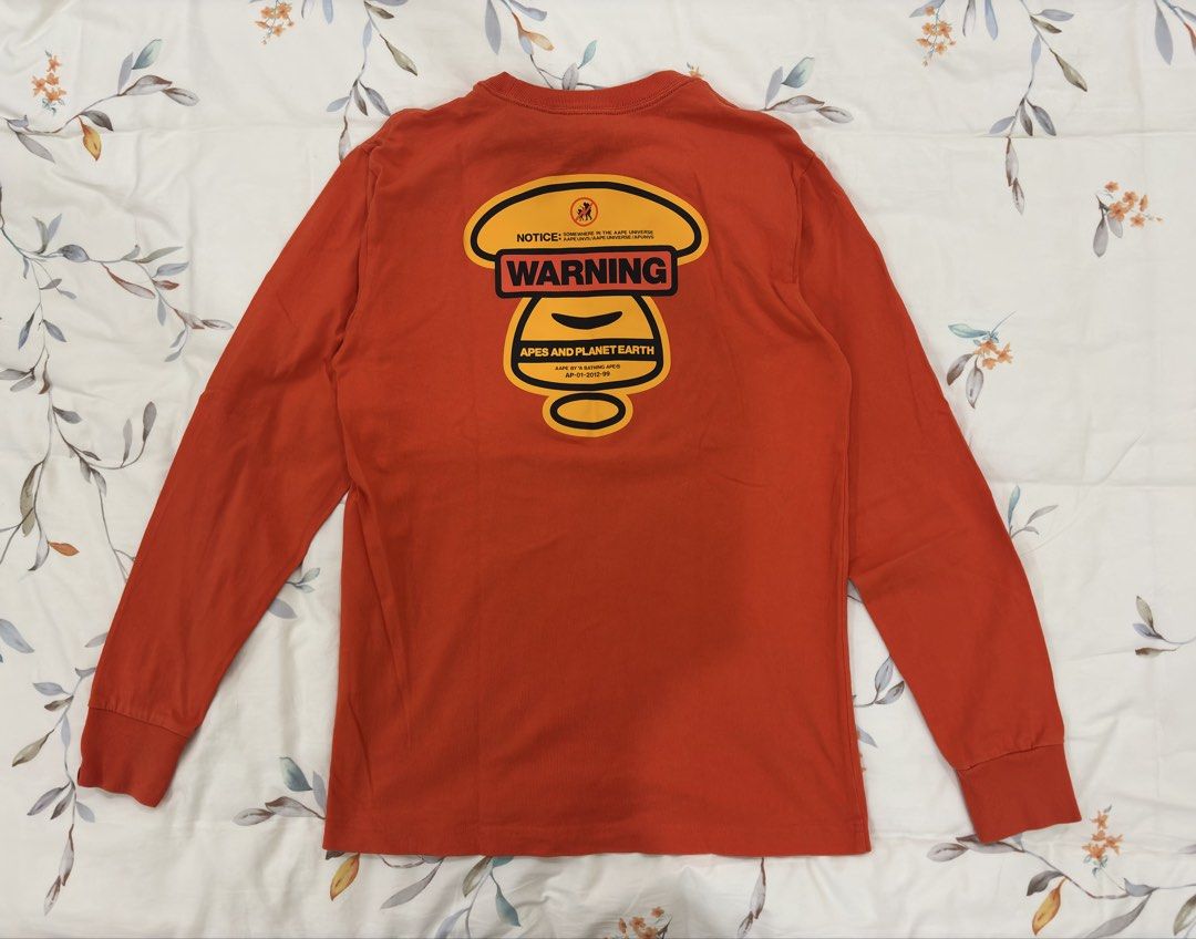 AAPE by A Bathing Ape Orange Long Sleeve Tee (Category: Tshirts & Polo Shirts ) located in Caloocan City. Submitted by foundagain (Listing ID 1441531398, Image 2). Description: size S used twice rfs decluttering payment first before shipping (gcash) .