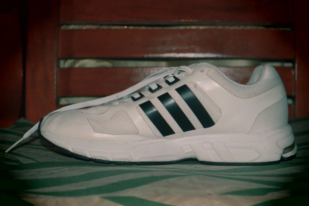 Adidas Men's Equipment (Category: Sneakers) located in Piddig. Submitted by itemsbycob (Listing ID 1441536071, Image 1). Description: - Brand: Adidas - Model: Men's Equipment - Color: White with black stripes - Size: EU 40.5 / UK 6.5 / US 7.5 - Condition: Excellent - Features: Iconic Adidas design, comfortable for daily wear. - Meetup Location: St. Anne Catholic Church, Piddig, Ilocos Norte. or delivery.